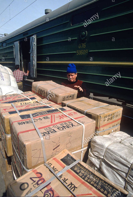 Stock Photo - Workers unload cargo from the Trans-Siberian railroad during a stop in Khabarovsk, Russia (4).jpg