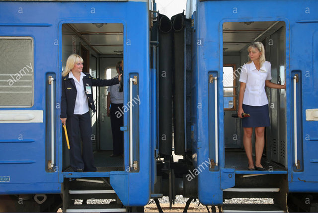 Stock Photo - Minsk, Belarus, train attendants standing in the door of a train.jpg