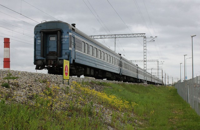 Passenger cars at the Liiva - Ülemiste line (29.05.2015). Transportation of GoRail passenger cars (10 cars) to Kazakhstan.jpg