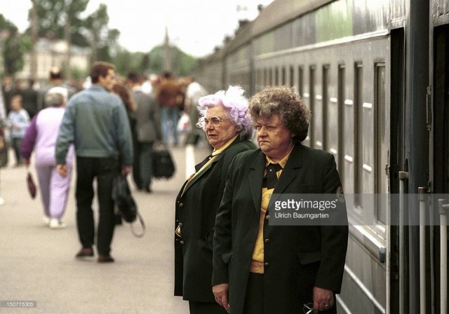 At the main station of the Estonian capital Tallinn, Conductresses in front of the «Tallinn-Express» that runs between Tallinn and Moscow (July 01, 1996).jpg
