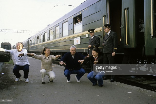 Russia, Siberia, Trans Siberian Train, passengers exercising at the station (January 01, 1982).jpg