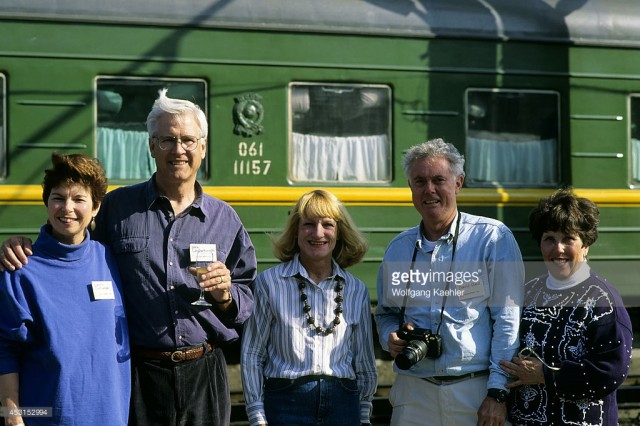 Russia, Stanford Traveler in front of train at the Station (January 01, 1993).jpg