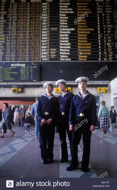 riga-latvia-1980s-three-young-male-sailors-in-their-uniform-look-up-A9TJ7F.jpg