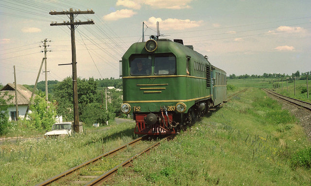 UZ TU2-263 with Golovanivsk - Gayvoron passenger train near Gayvoron station (02.07.2002).jpg